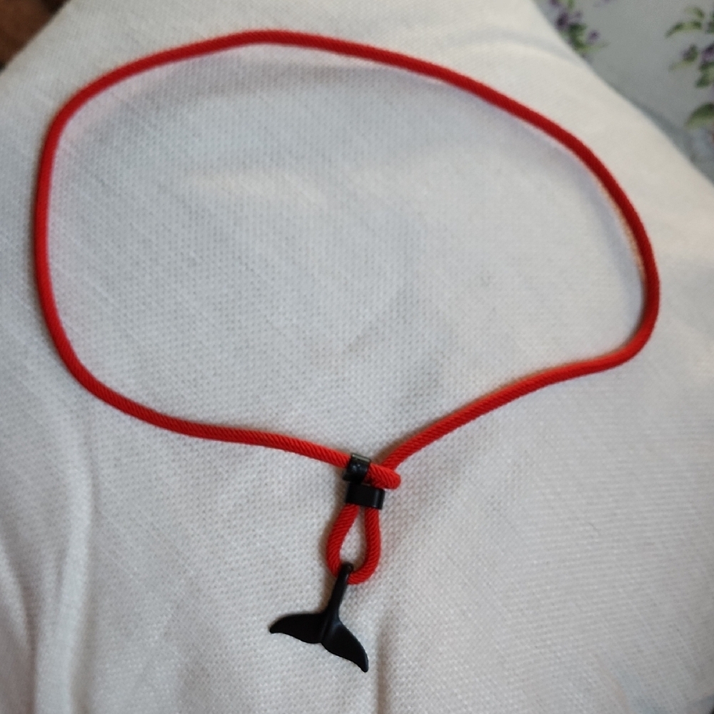 Red Cord Necklace with Black Whale Tail Pendant